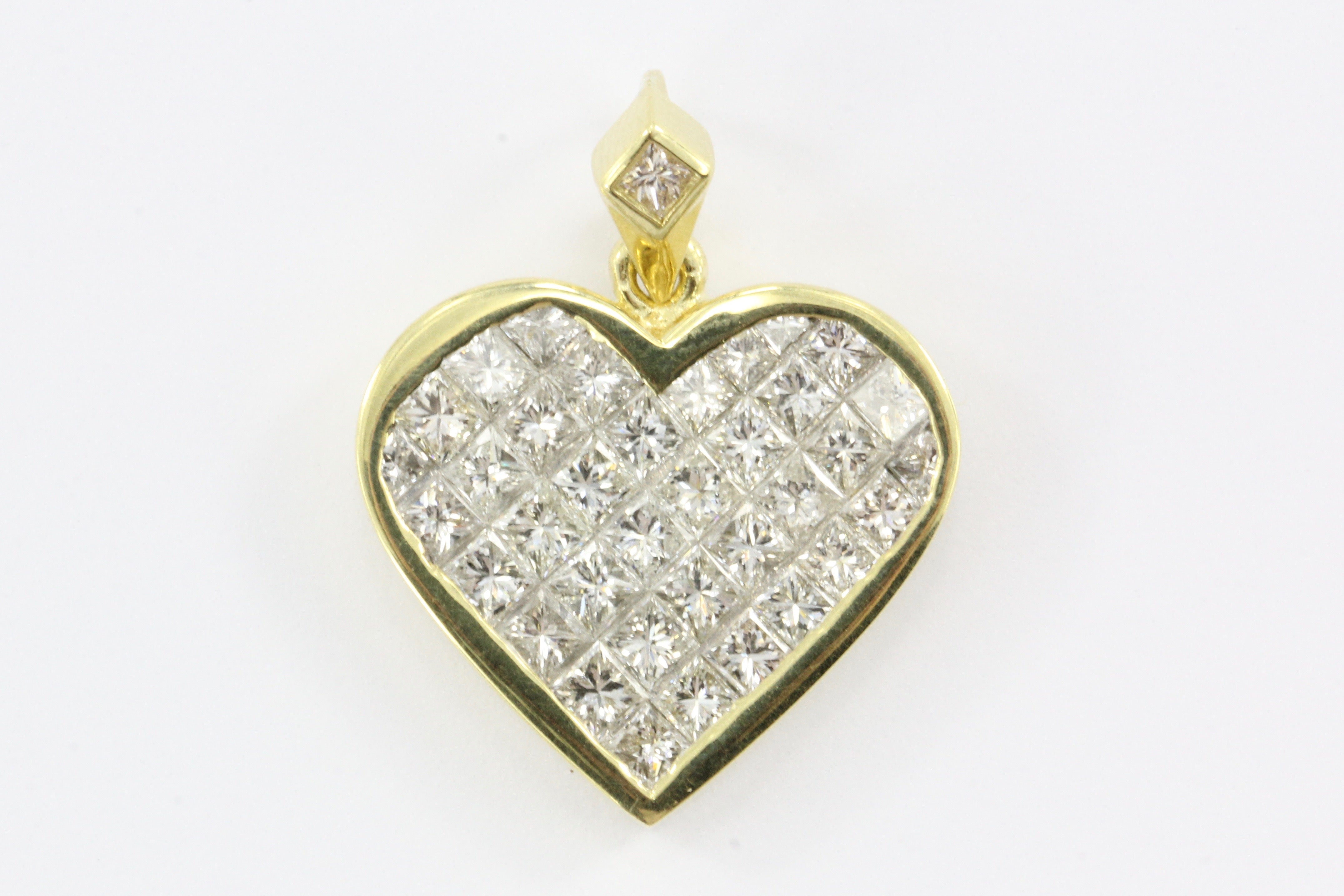 0.76 ctw Invisibly set Princess Cut Diamond Heart Pendant in 18k white gold