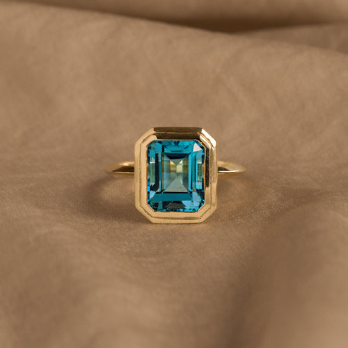 14K Yellow Gold 4.34 Carat Emerald Cut Swiss Blue Topaz Bezel Knife Edge Ring - Queen May