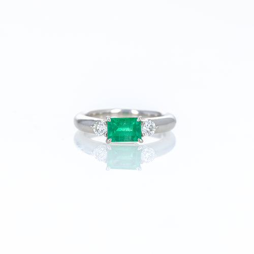 Platinum 0.71 Carat Emerald Diamond Three Stone Ring - Queen May