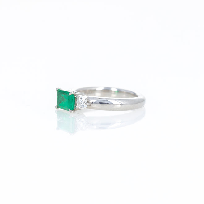 Platinum 0.71 Carat Emerald Diamond Three Stone Ring - Queen May