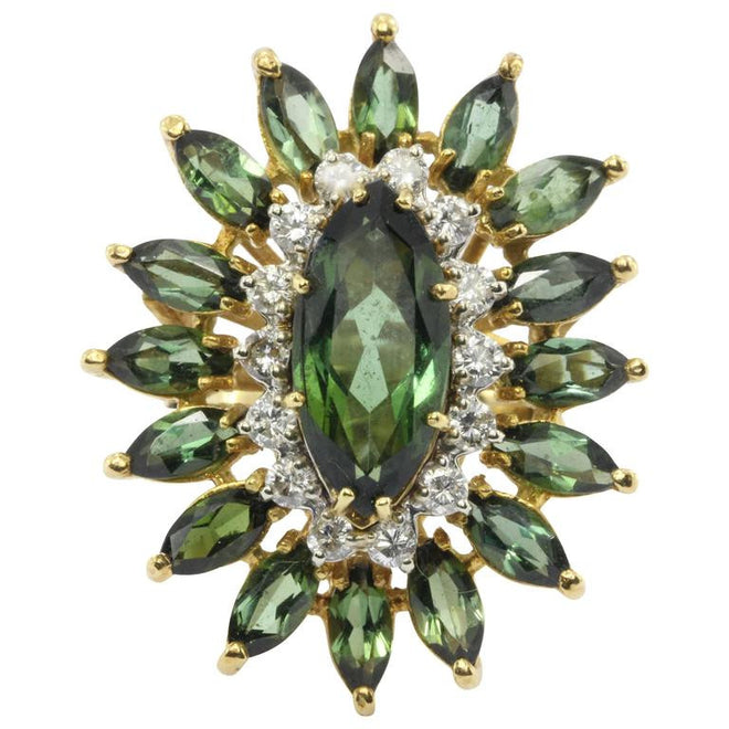 A 18k natural green tourmaline and diamond ring featuring 6.44 carats tw with laboratory appraisal - Queen May