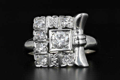 14K White Gold .25 CTR Diamond with .45 CTW Diamond Bow Ring - Queen May