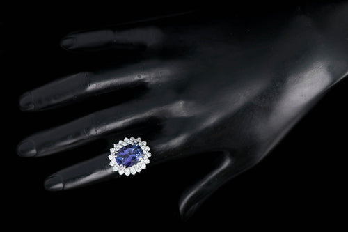 Modern Platinum 9.51 Tanzanite and Diamond Halo Ring - Queen May