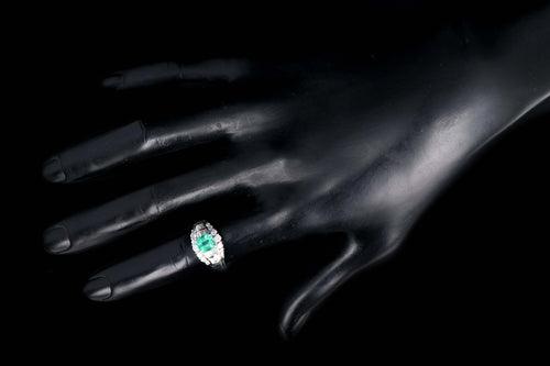 Retro Platinum .88 Carat Natural Emerald and Baguette Diamond Ring - Queen May