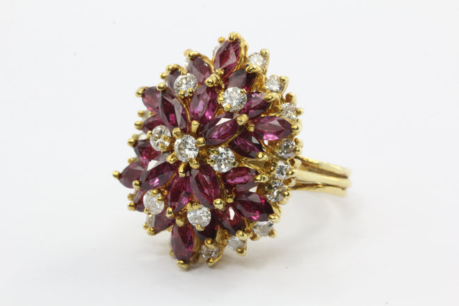 An 18k natural ruby and diamond cocktail ring featuring 5 carats of rubies and 1 carat of diamonds. - Queen May