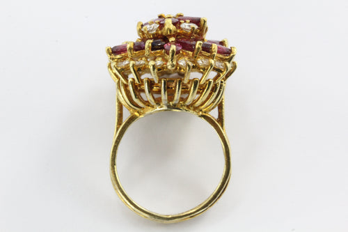 An 18k natural ruby and diamond cocktail ring featuring 5 carats of rubies and 1 carat of diamonds. - Queen May