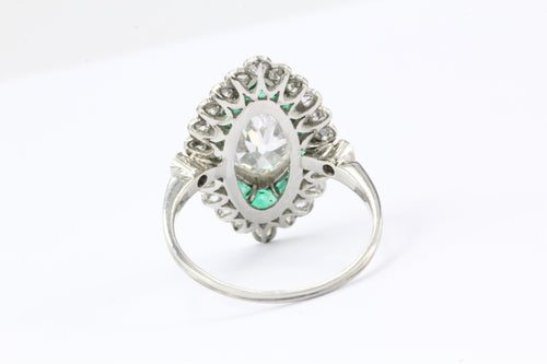 Edwardian Platinum 1.05 Carat Moval Diamond & Emerald Halo Engagement Ring - Queen May