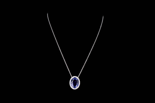 18K White Gold 19.23 Carat Oval Tanzanite & Diamond Halo Pendant Necklace - Queen May