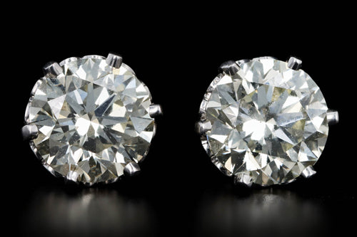 Round Cut Diamond Stud Earrings In 18K White Gold