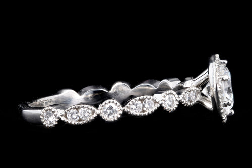 New Platinum .67 Carat Round Brilliant Diamond Halo Engagement Ring - Queen May