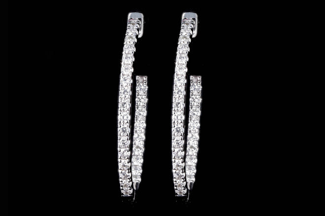 18K White Gold .80 Carat Total Weight Diamond Inside Out Oval Hoop Earrings - Queen May