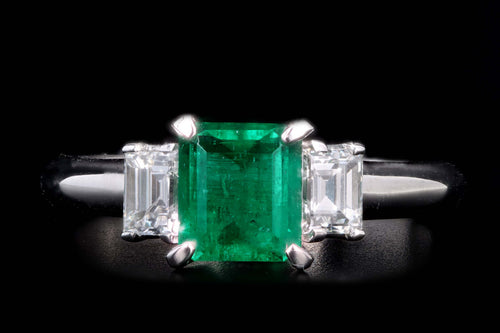 Modern Platinum .77 Carat Emerald & Diamond Ring - Queen May
