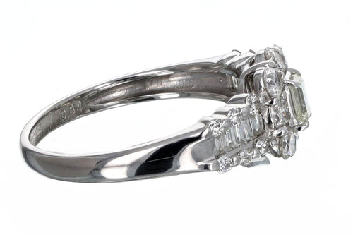 0.17 Carat Emerald Cut Diamond Halo Engagement Ring in Platinum - Queen May